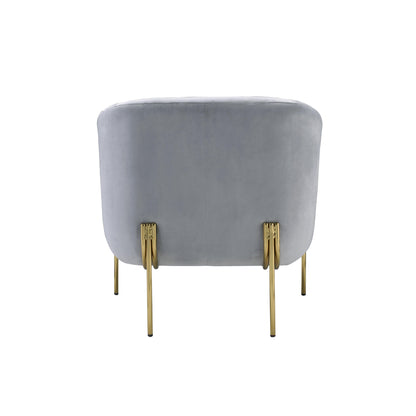 Light gray velvet barrel accent chair with gold legs.