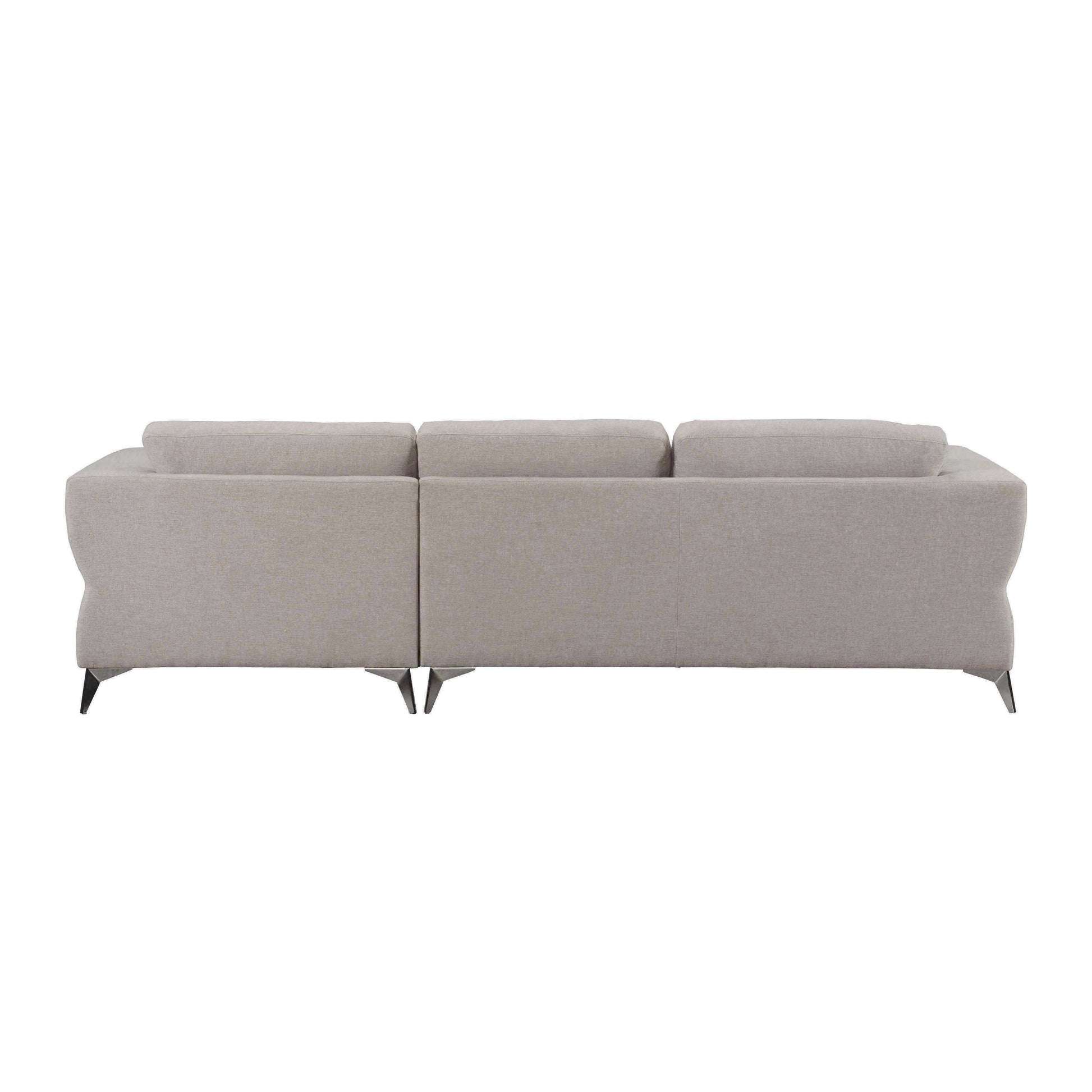 Back view of light tan sectional sofa. The sectional sofa has chrome metal legs.