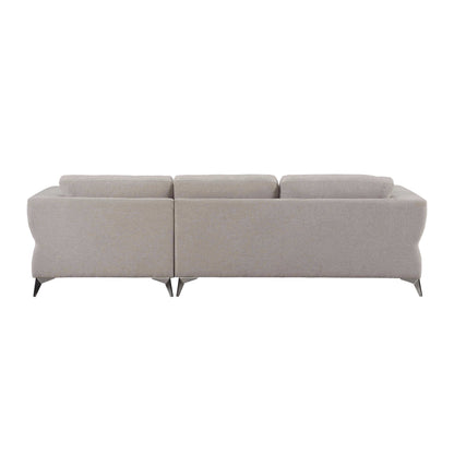 Back view of light tan sectional sofa. The sectional sofa has chrome metal legs.