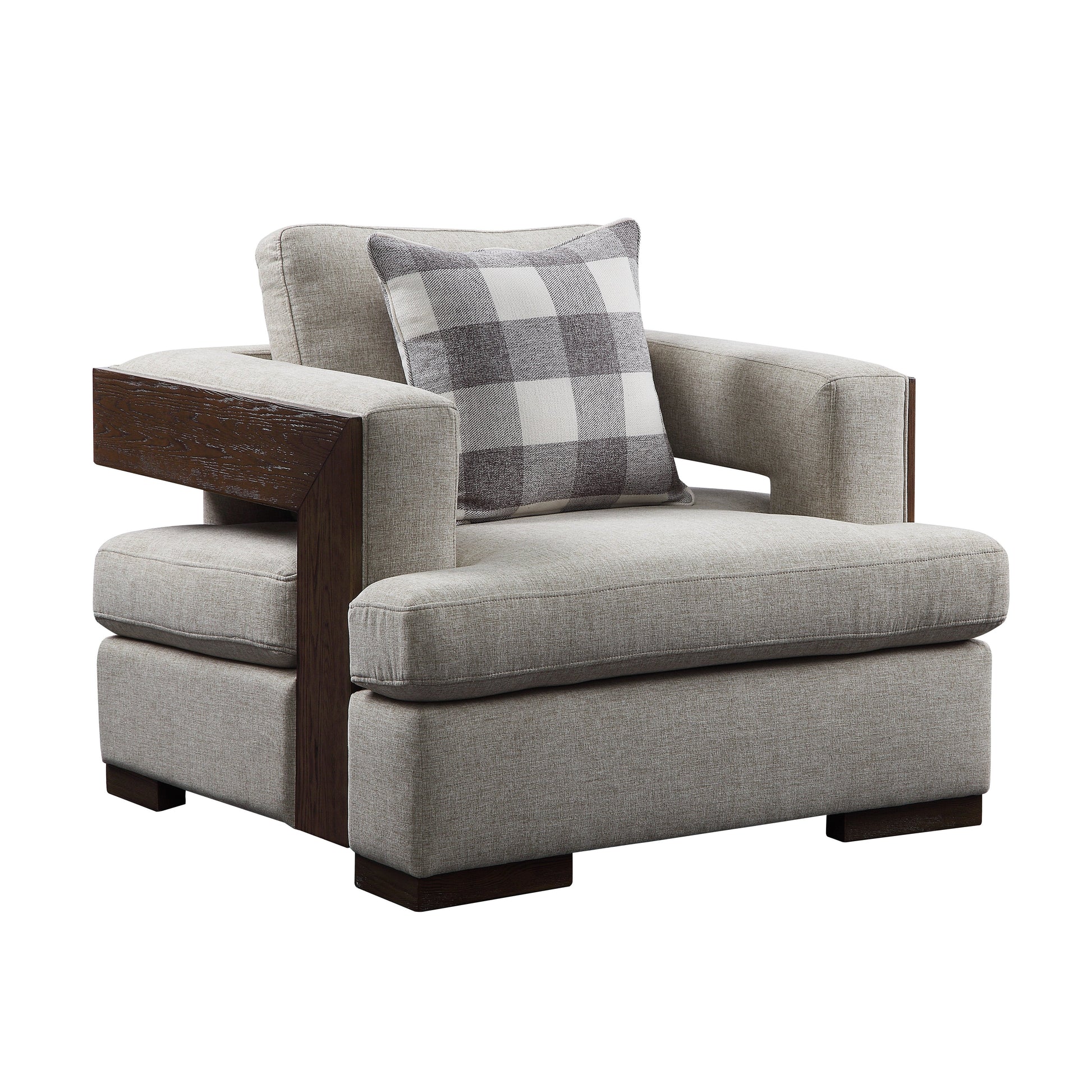 Light gray accent chair, exposed wooded trim with a rich walnut finish, and track style arms. One decorative pillow shown resting on the accent chair.